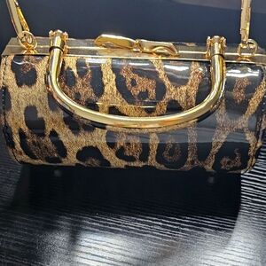 Elegant Gold and Black Leopard Print Handbag